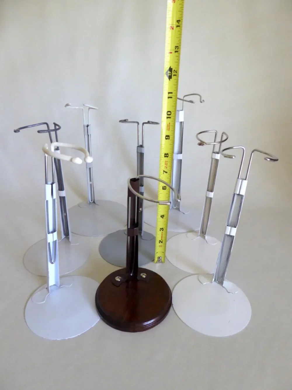 ADJUSTABLE METAL & WOOD BASE DOLL ENAMEL DISPLAY STAND LOT OF 8 (PRE-OWNED)